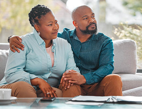 Back people, couple and listen to broker at home for funeral cover or life policy planning. Relationship, meeting and serious for financial for advice on house insurance with paperwork and contract.